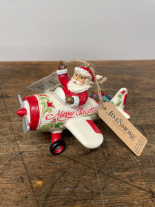 Ornament Santa in airplane