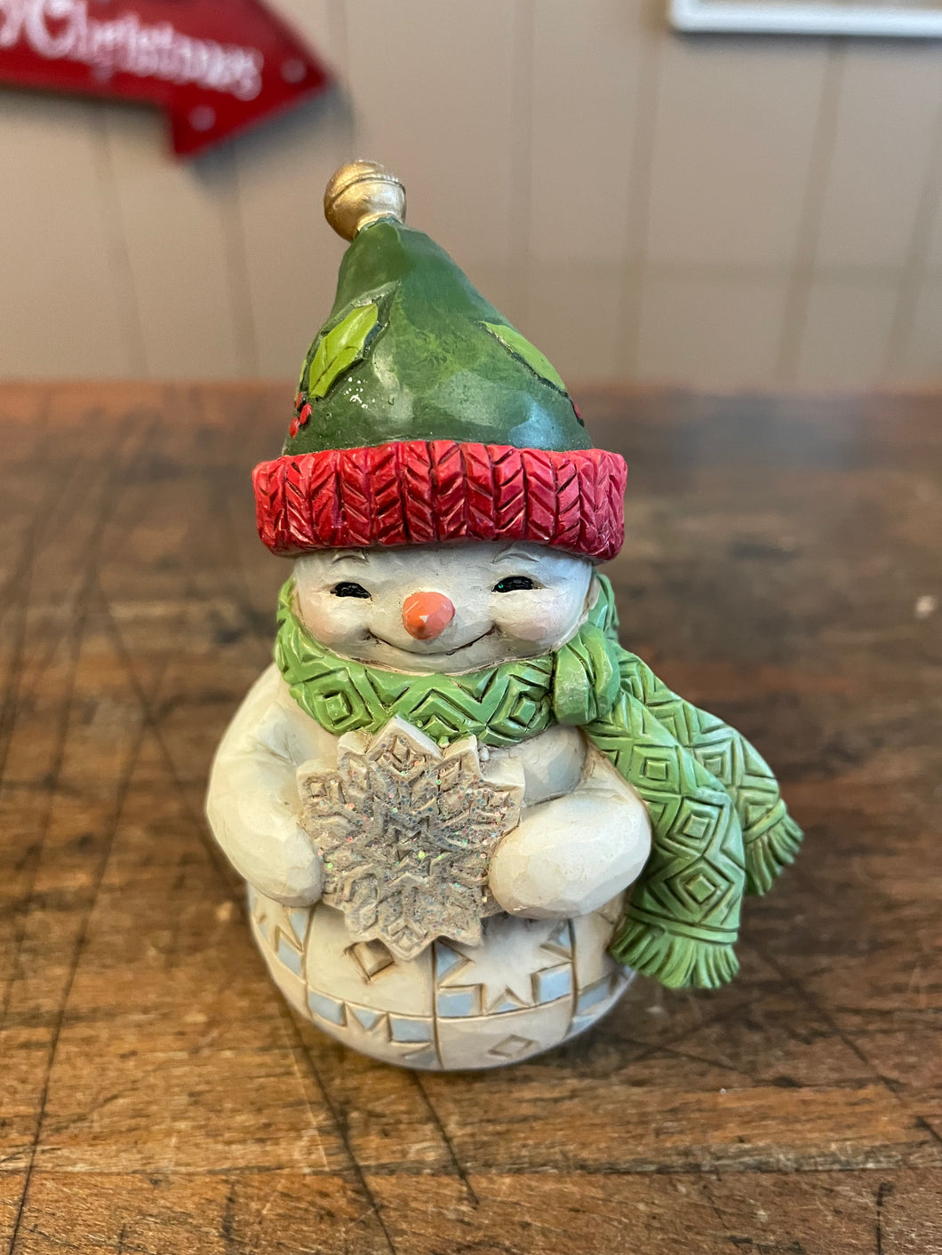 Jim shore snowman with snowflake
