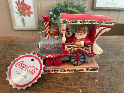 Jim shore Santa in Coca Cola train
